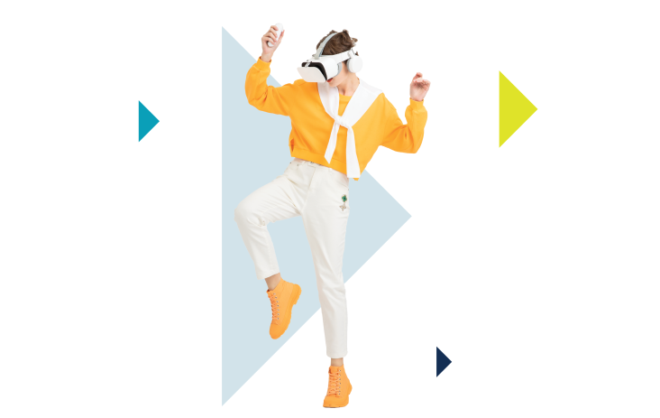 A person dances while wearing a VR headset.